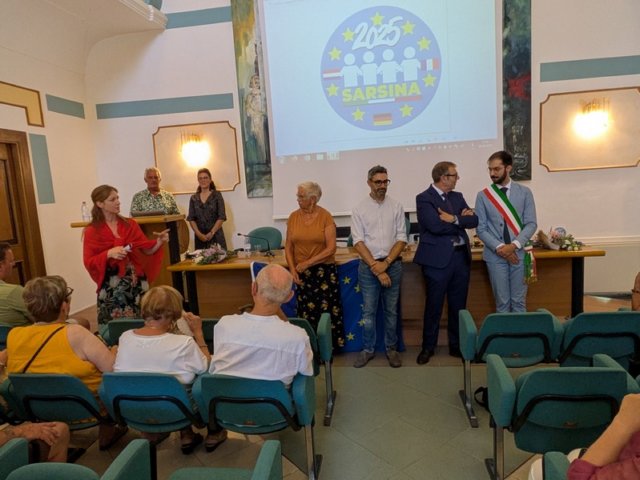 officieledeelvandebijeenkomst.jpg